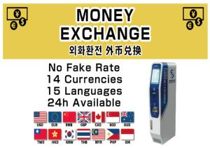 a sign that reads money exchange with the words no fake rate emergencies languages at APA Hotel Namba Shinsaibashi Nishi in Osaka