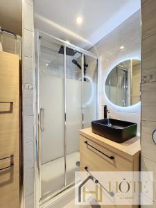 Ванная комната в Vue Capitainerie , Charme & Confort en Bord de Mer