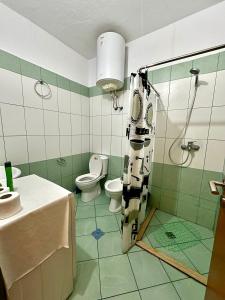 Koupelna v ubytování Apartment Ermest ,Kavaje Rock