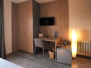 TV a/nebo společenská místnost v ubytování Hostal Rural Can Pau
