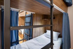 Postel nebo postele na pokoji v ubytování Tropica Inn Hostel