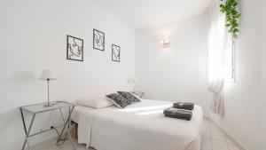 Posteľ alebo postele v izbe v ubytovaní CASA NOSTRA, Port-Grimaud, Vue sur les Canaux
