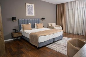 Postel nebo postele na pokoji v ubytování Port Rivoli Hotel Baku