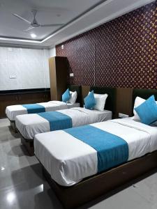 Postel nebo postele na pokoji v ubytování Hotel MD Grand + 16 fotografií