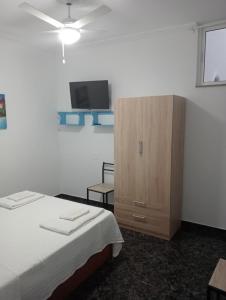 Postel nebo postele na pokoji v ubytování Hakuna Matata