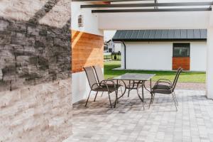 Patio lub wspólna przestrzeń na świeżym powietrzu w obiekcie APARTAMENTY LAS Zator