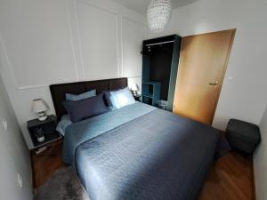 Posteľ alebo postele v izbe v ubytovaní Apartment Peruč with big terrace and beautiful garden