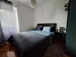 Posteľ alebo postele v izbe v ubytovaní Apartment Peruč with big terrace and beautiful garden