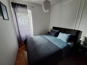 Posteľ alebo postele v izbe v ubytovaní Apartment Peruč with big terrace and beautiful garden