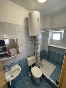 Koupelna v ubytování Apartment Martina Tučepi