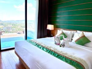 208 Ao Nang, Private Sea View Pool Villa客房内的一张或多张床位
