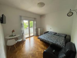 Postel nebo postele na pokoji v ubytování Apartment Martina Tučepi