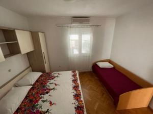 Postel nebo postele na pokoji v ubytování Apartment Martina Tučepi