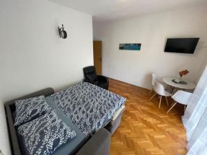 Postel nebo postele na pokoji v ubytování Apartment Martina Tučepi