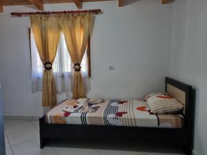 Postel nebo postele na pokoji v ubytování Apartment Besnik Brahimi Ksamil
