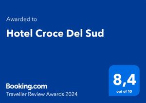 Certifikat, nagrada, logo ili neki drugi dokument izložen u objektu Hotel Croce Del Sud