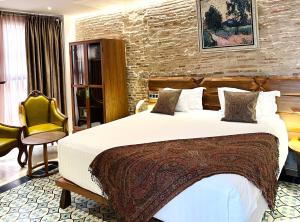 Posteľ alebo postele v izbe v ubytovaní Anahita Boutique Hotel + 37 fotografií