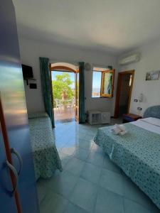 Voodi või voodid majutusasutuse B&B Giardini di Iside e Osiride toas