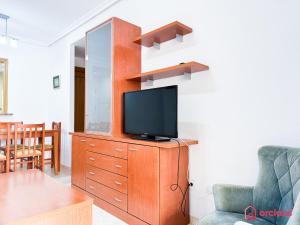 TV a/nebo společenská místnost v ubytování Caribe Paradise