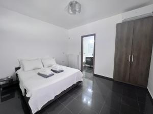 Posteľ alebo postele v izbe v ubytovaní Olivujoj Villajoj - Deluxe Villa with Detached Pool House