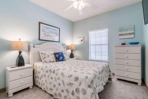 Ένα ή περισσότερα κρεβάτια σε δωμάτιο στο Orange Beach Villas - Casa Bella +30 φωτογραφίες