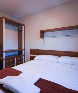 Postel nebo postele na pokoji v ubytování Hotel Imperatriz