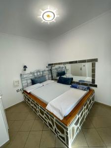 a bedroom with a large bed in a room at Vikis Dream Views in Skala Mistegnon