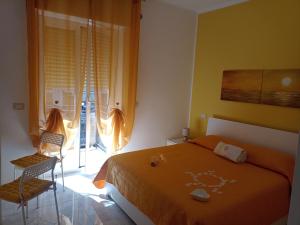 Postel nebo postele na pokoji v ubytování SUN & MOON B&B