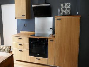 Кухня или мини-кухня в Appartement hypercentre 6 pers
 +8 фотографий