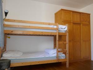 Кровать или кровати в номере Appartement hypercentre 6 pers