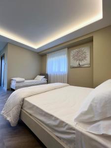 Un pat sau paturi într-o cameră la Tenute Masullo