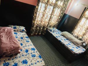 Postel nebo postele na pokoji v ubytování Hotel gaule