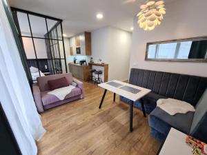 พื้นที่นั่งเล่นของ Unique Apartments - Browar Gdański