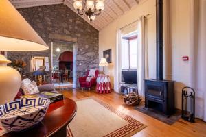 TV a/nebo společenská místnost v ubytování Tradicampo Eco Country Houses