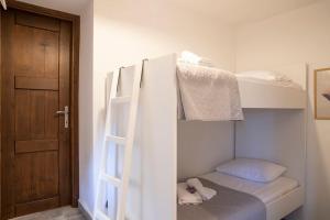 Postel nebo postele na pokoji v ubytování Alexandras guesthouse