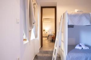 Postel nebo postele na pokoji v ubytování Alexandras guesthouse