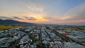 an aerial view of a city at sunset at Happy House Quy Nhơn in Quy Nhon