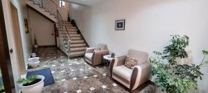 Posezení v ubytování Fnideq Seaside Apartment