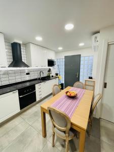 Η κουζίνα ή μικρή κουζίνα στο Casita unifamiliar junto al mar