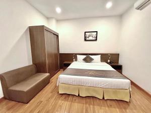Giường trong phòng chung tại Bazan Xanh