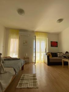 Coin salon dans l'établissement Apartman Ana 2