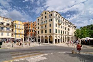 a group of buildings on a city street at Island Suite, Old Town in Corfu