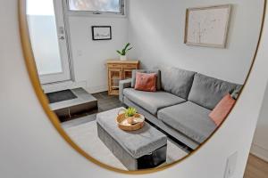 a living room with a couch and a table at Suite in the heart of downtown Toronto in Toronto
