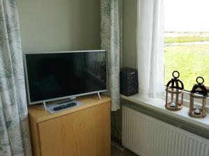 En TV eller et underholdningssystem på Welcome in Jisp