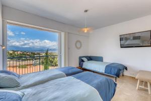 Fotografia z galérie ubytovania Stunning Sea View Cote d'Azur Villa - Rives d'Or v destinácii Fréjus