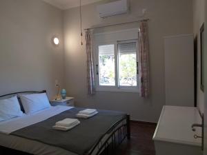 Postel nebo postele na pokoji v ubytování Skala Central House