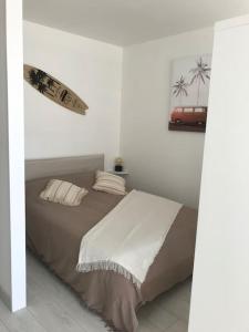 Ένα ή περισσότερα κρεβάτια σε δωμάτιο στο Studio « Oasis Provençale »