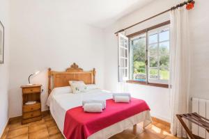 Postel nebo postele na pokoji v ubytování Finca Ses Curtanetas