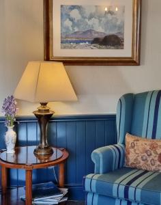 Ein Sitzbereich in der Unterkunft White Sands Hotel