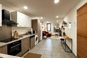 Η κουζίνα ή μικρή κουζίνα στο Très bel appartement climatisé - Chez Tom et Anna